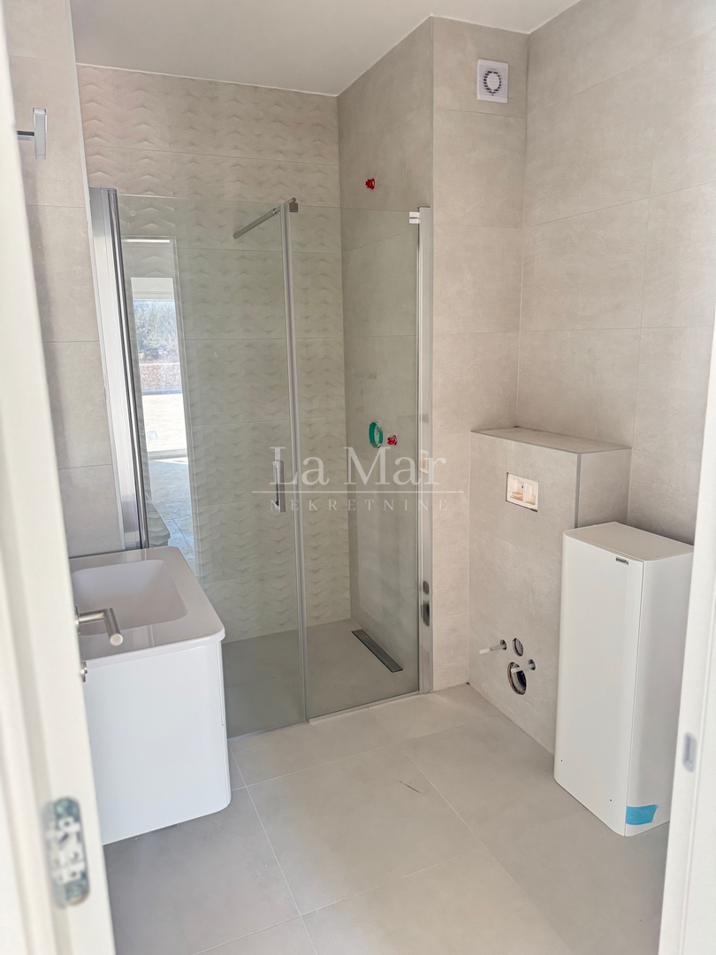Novalja - Vrhunska novogradnja s pogledom na more - 79,33m2 - prizemlje
