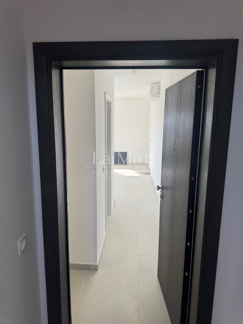 EKSKLUZIVNO! Novogradnja u Novalji s pogledom na more -Z2 - A2- 66,79 m2 - I kat