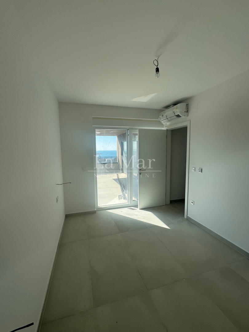EKSKLUZIVNO! Novogradnja u Novalji s pogledom na more -Z2 - A2- 66,79 m2 - I kat