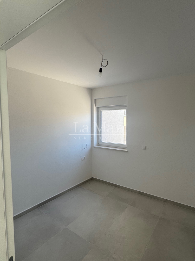 Novalja - Vrhunska novogradnja s pogledom na more-Z2 - A3- 68.67 m2 - II kat