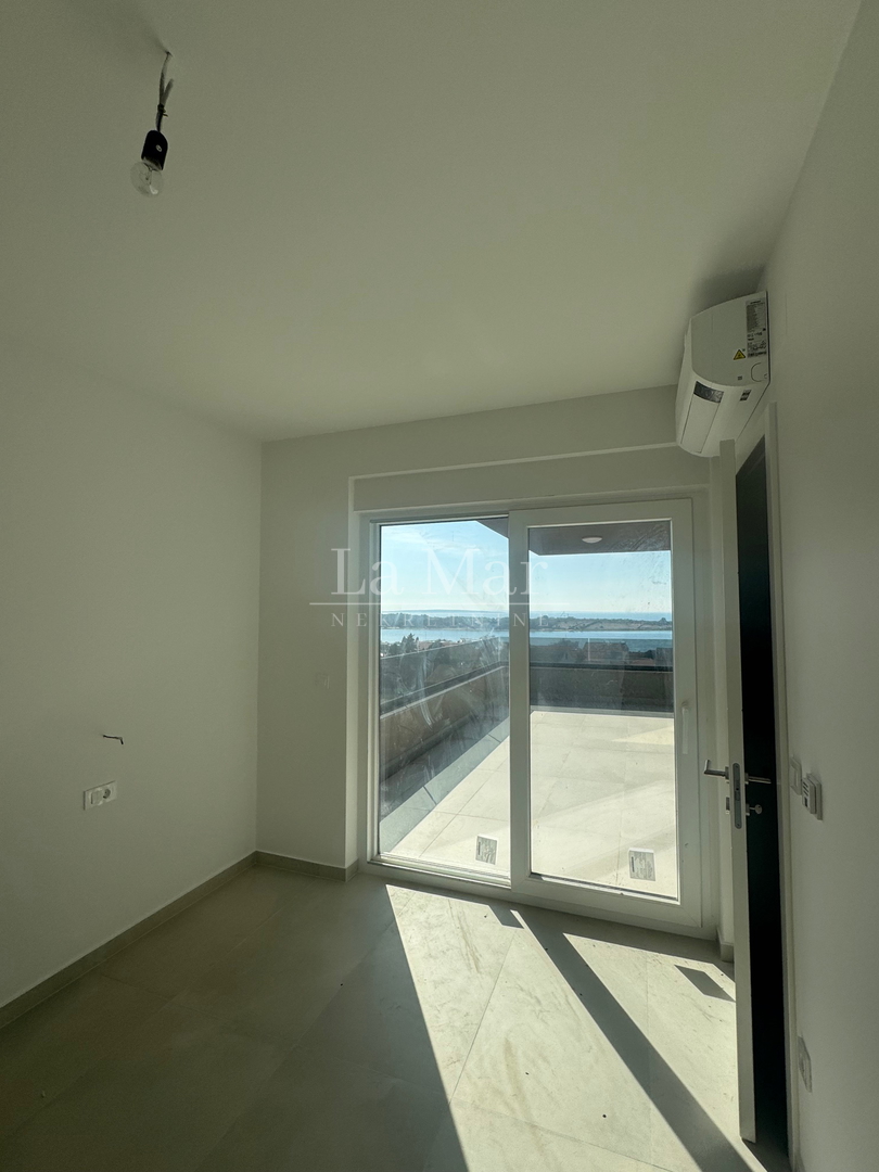 Novalja - Vrhunska novogradnja s pogledom na more-Z2 - A3- 68.67 m2 - II kat