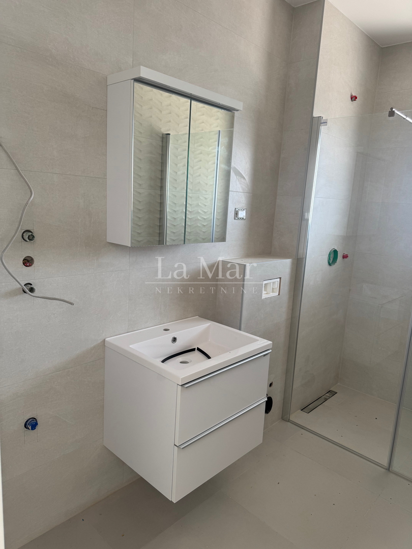 Novalja - Vrhunska novogradnja s pogledom na more-Z2 - A3- 68.67 m2 - II kat