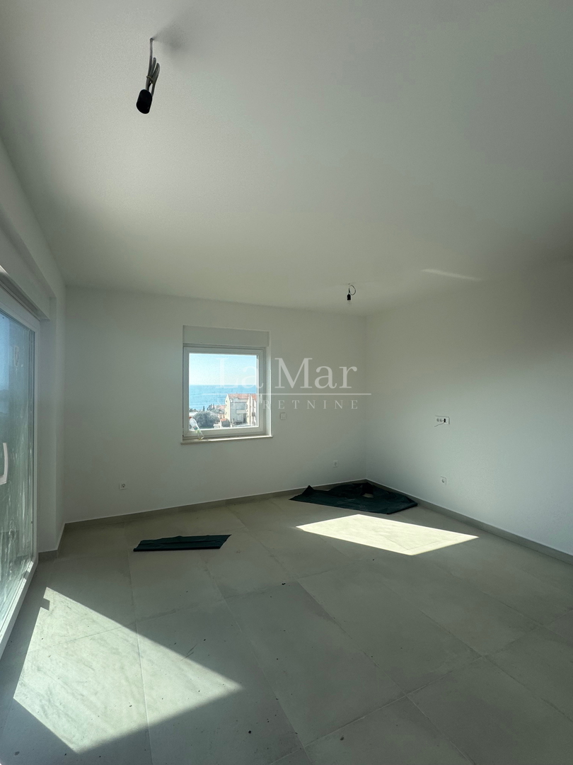 Novalja - Vrhunska novogradnja s pogledom na more-Z2 - A3- 68.67 m2 - II kat