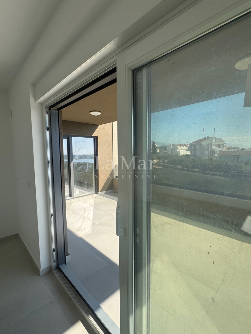 Novalja - Vrhunska novogradnja s pogledom na more-Z2 - A3- 68.67 m2 - II kat