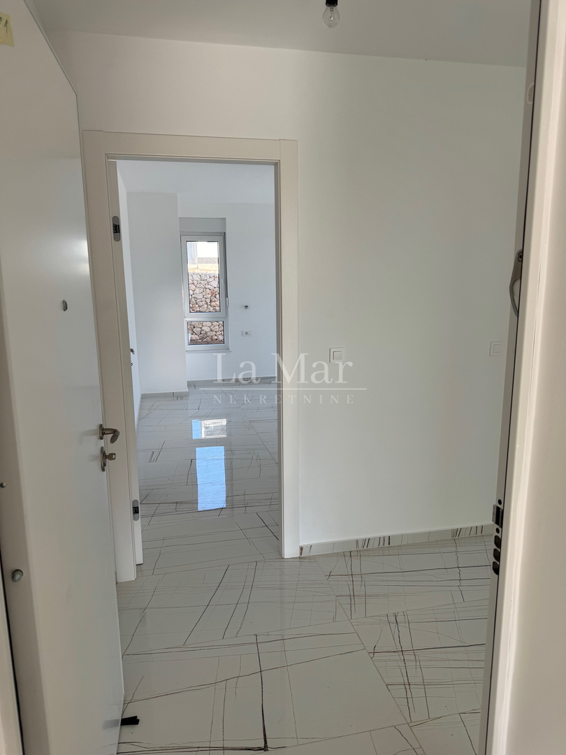 Novalja- namještena NOVOGRADNJA s pogledom na more - S1 - prizemlje  81,6 m2- 290.000€