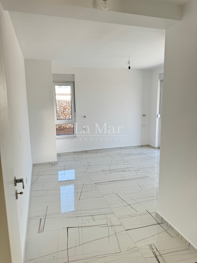 Novalja- namještena NOVOGRADNJA s pogledom na more - S1 - prizemlje  81,6 m2- 290.000€