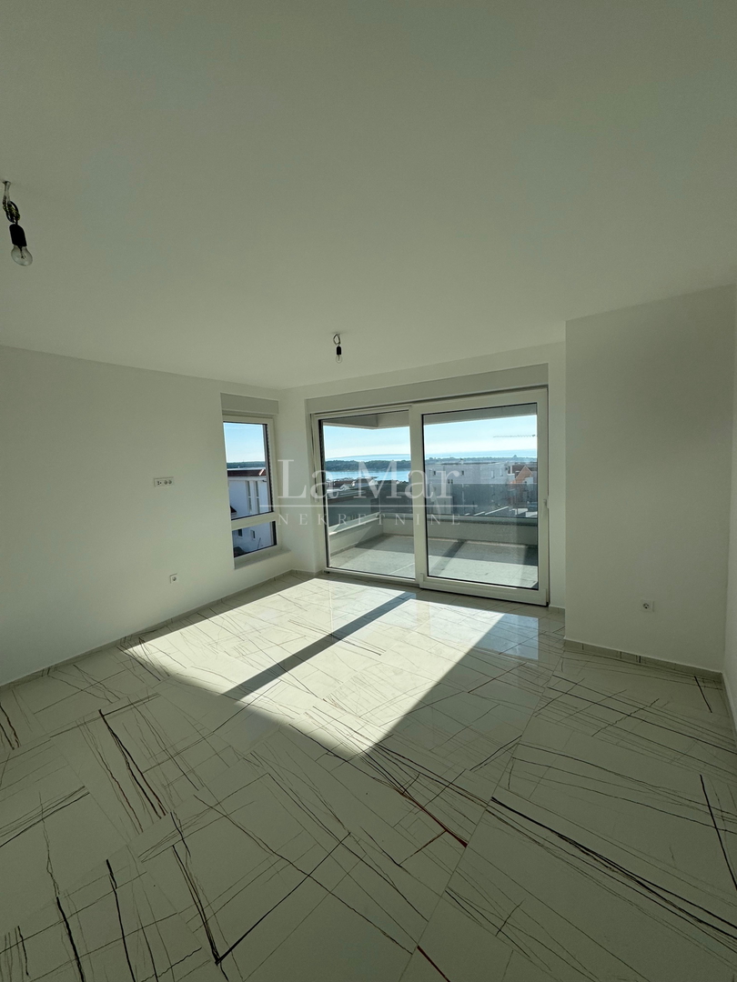 Novalja- namještena NOVOGRADNJA s pogledom na more - A2 - I. kat-  68,3 m2 - 260.000€