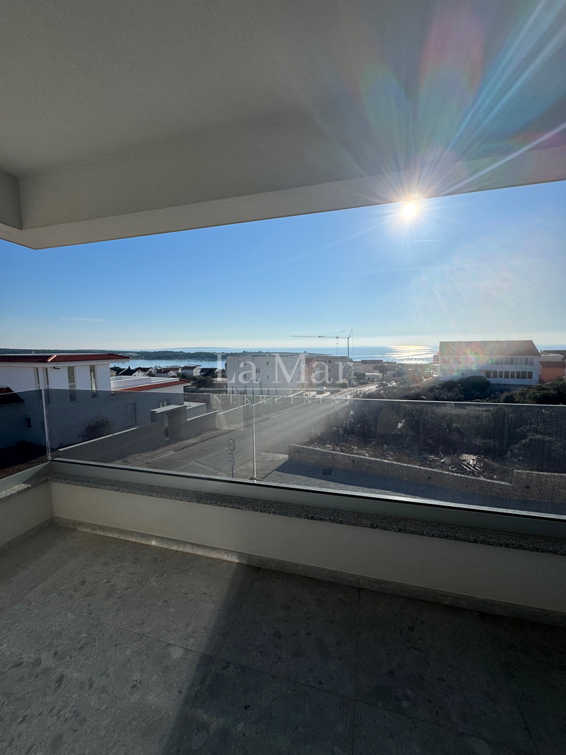 Novalja- namještena NOVOGRADNJA s pogledom na more - A2 - I. kat-  68,3 m2 - 260.000€