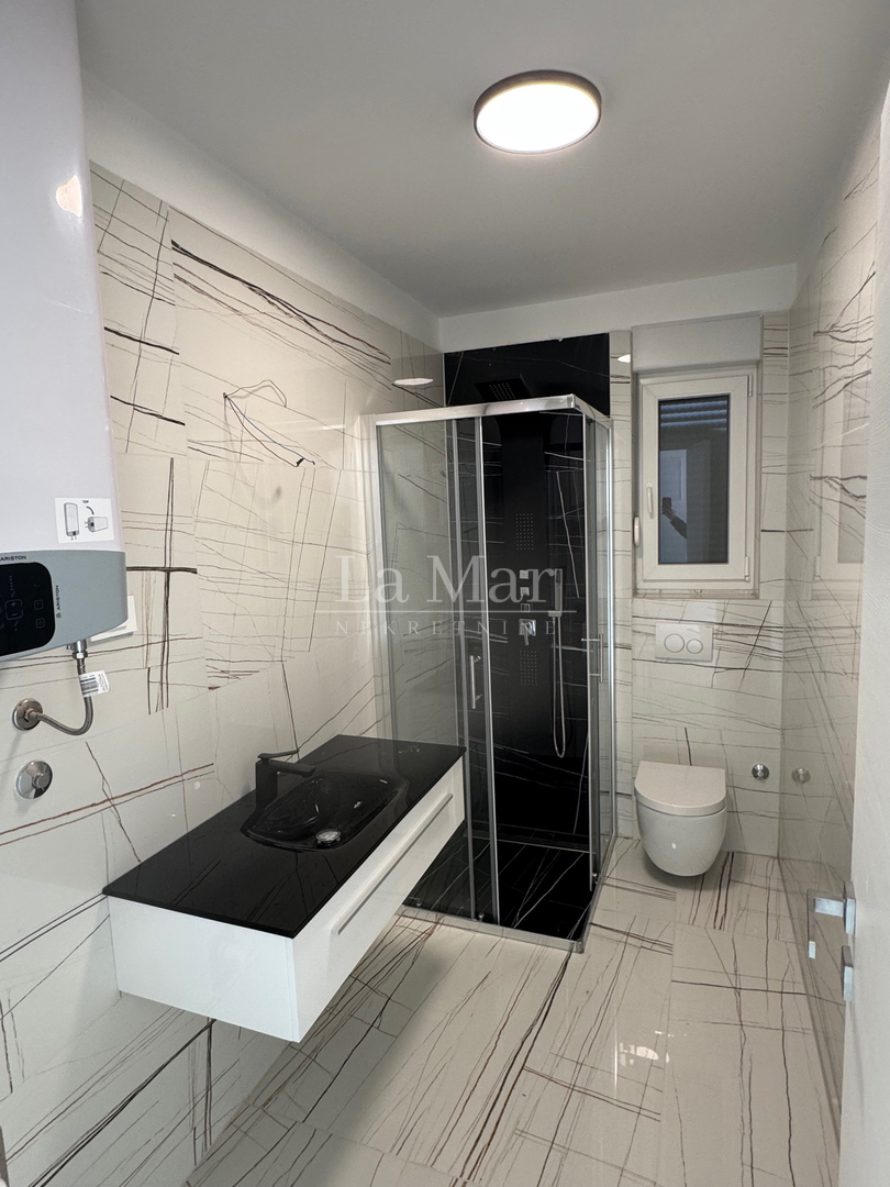 Novalja- namještena NOVOGRADNJA s pogledom na more - A2 - I. kat-  68,3 m2 - 260.000€