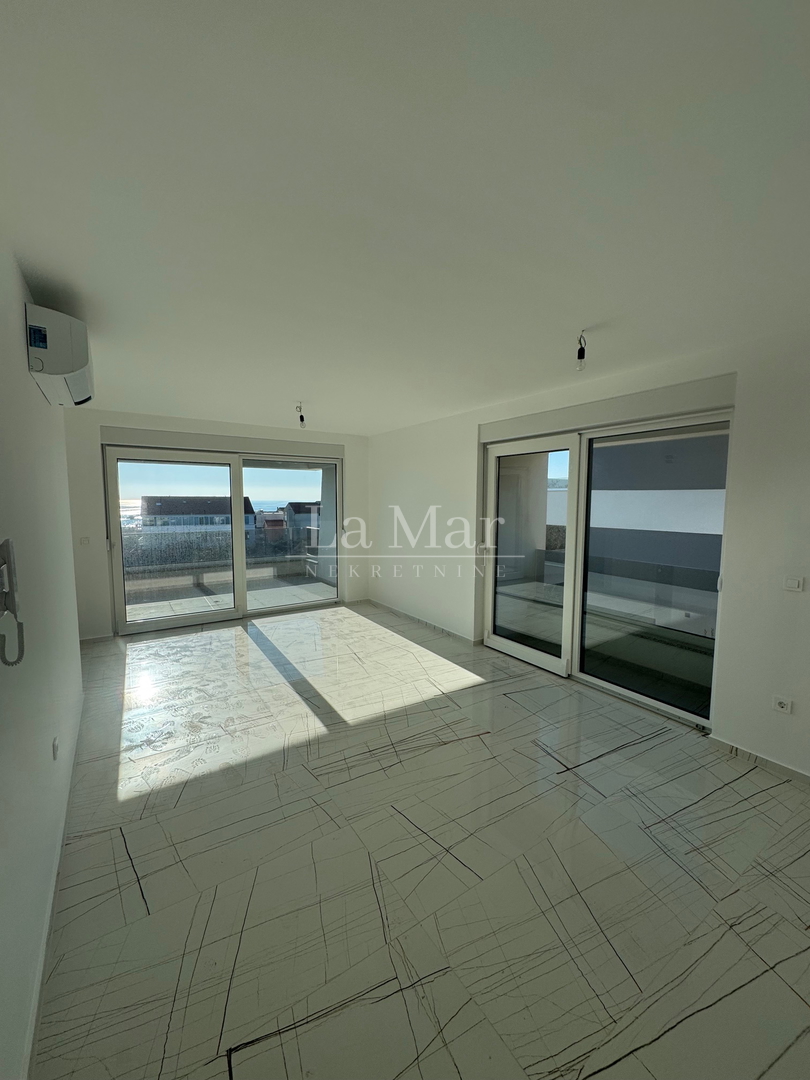 Novalja - namještena NOVOGRADNJA  s  pogledom na more - S2 - I. kat- 56.75 m2- 210.000€