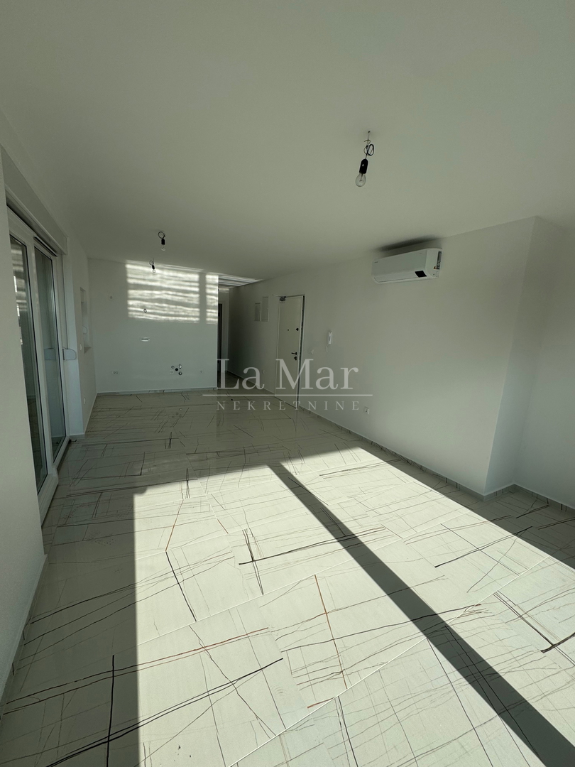 Novalja - namještena NOVOGRADNJA  s  pogledom na more - S2 - I. kat- 56.75 m2- 210.000€