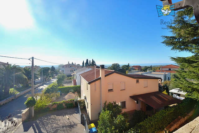 Casa con appartamenti e una bellissima vista sul mare