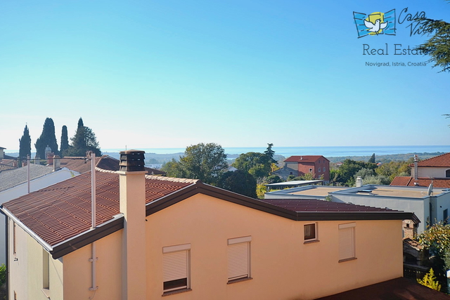 Casa con appartamenti e una bellissima vista sul mare